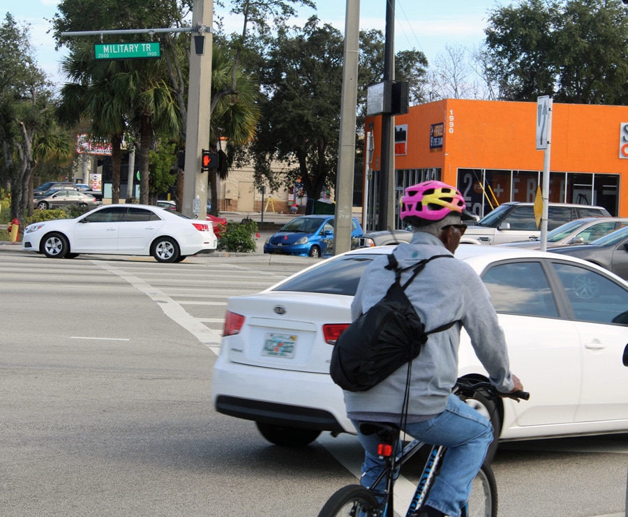Man riding bike on military trail in West Palm Beach, FL